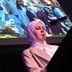 Vorschau: Samah Zarka vom LEB-Projekt „Küche im Quartier“ beim Lesen ihres Textes. Foto: Torsten von Reeken.